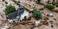 epa09618978 An aerial view taken with a drone shows a cemetery after flooding in Bad Neuenahr-Ahrweiler, Germany, 16 July 2021. Large parts of Western Germany were hit by heavy, continuous rain in the night to 15 July resulting in local flash floods that destroyed buildings and swept away cars.  EPA-EFE/FRIEDEMANN VOGEL