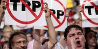Delegates protest against the TPP at the Democratic National Convention in 2016 in Philadelphia. (Photo: Drew Angerer / Getty Images)