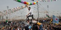 People dance and sing songs as they celebrate Newroz festivities on March 21, 2021 in Diyarbakir, Turkey. Newroz is the Kurdish celebration of Nowruz, the Persian New Year and the spring equinox, which is celebrated by diverse communities across western and central Asia. Newroz is the most important festival in Kurdish culture and has taken the form of political expression among Kurds in Turkey. A top Turkish prosecutor filed a case with the constitutional court on Wednesday demanding the closure of the pro-Kurdish People’s Democratic Party (HDP), in the culmination of a years-long clampdown on Turkish Parliament’s third largest party. (Photo by Burak Kara/Getty Images)