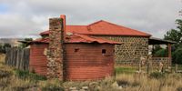 Hillston Schoombee: A preserved old Anglo Boer blockhouse doubles as a braai area next to the solid ironstone Hillston cottage.