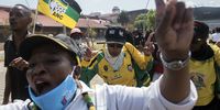 ANC supporters as songs of struggle is sung at a march at <br>Mary Fitzgerald Square in Newtown Johannesburg. The march was organised by the MKMVA in support of Jacob Zuma,  RET interests and Ace Magashule's attempted arrest.<br>Photo / Shiraaz Mohamed