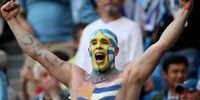  Supporter of Uruguay celebrates the opening goal during the FIFA World Cup 2018 group A preliminary round soccer match between Uruguay and Russia in Samara, Russia, 25 June 2018. EPA-EFE/WALLACE WOON