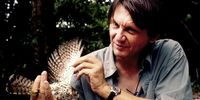 Carl Jones with a Mauritius kestrel, which he saved from extinction and of which there are now about 500 individuals.<br>(Photo: Supplied)