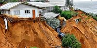 View of a gully newly gouged by floodwaters in 2022 between Surfside in KwaZulu-Natal and its Umdloti neighbours. (Photo: Des Erasmus)