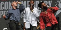 GLASTONBURY, ENGLAND - JUNE 27:  (L-R) 'G' Hastings, Alloysious Massaquoi and Kayus Bankole of Young Fathers perform live on the Other stage during the second day of Glastonbury Festival at Worthy Farm, Pilton on June 27, 2015 in Glastonbury, England.  (Photo by Jim Dyson/Getty Images)