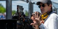 Director and producer Joseph Kosinski on the set of F1: The Movie. Photo: Apple TV+