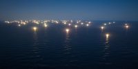The Chinese squid fleet’s bright lights illuminate the sky at night. 25 February 2022 (Photo: The Outlaw Ocean Project/Ed Ou)