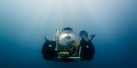 OceanXplorer houses multiple deep-sea research vehicles including two Triton submersibles, and a USV (unmanned surface vehicle). This a submersible underwater during their Around Africa Expedition. (Photo- OceanX)