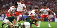 William Havili of Tonga is tackled by Marvin Orie of South Africa at Stade Velodrome in Marseille. (Photo: Cameron Spencer / Getty Images)