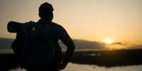 Joseph ‘Travel Mufasa’ Makowa watches on as the sun rises on another day in his home country, Zimbabwe.<br>(Screengrab: Wild Africa Fund)
