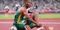 TOKYO, JAPAN - AUGUST 01: Gift Leotlela of Team South Africa lies injured after his semi final in the mens 100m during the evening session of the Athletics event on Day 9 of the Tokyo 2020 Olympic Games at the Olympic Stadium on August 01, 2021 Tokyo, Japan. (Photo by Roger Sedres/Gallo Images)