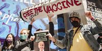 Activists standing outside Pfizer headquarters, Manhattan, New York  demand that US President Joe Biden support the Trips waiver, which would lift the intellectual property protection for the Covid-19 vaccines. <br>(Photo: Steven Francis Kong)