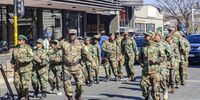 Operation Dudula members march to the Human Rights Commission in Johannesburg on 17 July 2025. The organisation alleges that some NGOs and Chapter 9 institutions are protecting illegal immigrants. (Photo: Gallo Images / OJ Koloti)
