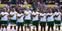 Aseza Hele, Sinazo Mcatshulwa, Sizophila Solontsi, Danelle Lochner, Babalwa Latsha, Lindelwa Gwala, Sanelisiwe Charlie and Nolusindiso Booi of South Africa sing the national anthem prior to the Women's Rugby World Cup 2025 quarterfinal against New Zealand at Sandy Park in Exeter, England. (Photo: Dan Istitene/Getty Images)