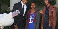 WASHINGTON, DC - NOVEMBER 21:  U.S. President Barack Obama (L) and daughters Sasha Obama (2nd L) and Malia Obama (R) share a moment as he pardons the 2012 National Thanksgiving Turkey Cobbler during a Rose Garden event November 21, 2012 at the White House in Washington, DC. Cobbler and its companion Gobbler will spend the rest of their lives at George Washington's Mount Vernon Estate and Gardens in Virginia.  (Photo by Alex Wong/Getty Images)