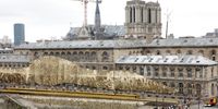 PARIS, FRANCE - JULY 26: The Notre-Dame Cathedral is seen during the opening ceremony of the Paris 2024 Olympic Games in Paris, France, July 26, 2024. (Photo by Zhang Yuwei - POOL/Getty Images)