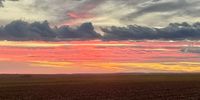 Big sky sunset over a land just planted to maize, eastern Free State. Image: Llewellyn Angus