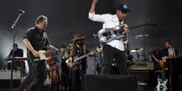 6 February 2015: From left, Bruce Springsteen, Don Was and Tom Morello perform at the MusiCares Person of the Year Gala honouring Bob Dylan at the Los Angeles Convention Center. (Photograph by Kevin Mazur/ WireImage)