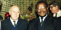South Africa, Australia and New Zealand rugby teams in a mine at Gold Reef City in Johannesburg, South Africa. In attendance were President FW de Klerk and Mangosuthu Gatsha Buthelezi. Pictured are Schutte Bekker (L), FW de Klek, Buthelezi, Nick Farr-Jones, Johannesburg, 1992. (Photo by Wessel Oosthuizen/Gallo Images