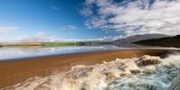 Theewaterskloof Dam overflowing at a record rate after unprecedented rains wreaks havoc in large parts of the Western Cape. Photographer: Jaco le Roux<br>