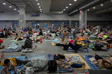 Shared beds, shrinking budgets: China’s young workers feel economic squeeze