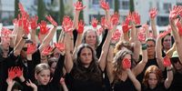 Families of Israeli hostages held by Hamas in Gaza and their supporters with their hands painted in red take part in a protest performance to mark 200 days since the 07 October abductions and attack, in Habima square in Tel Aviv, Israel, 23 April 2024. According to the Israeli military, 133 Israelis, who were abducted and taken to the Gaza Strip during the 07 October 2023 attacks by Hamas, remain in captivity. Rallies in Israel have been critical of the government's handling of the crisis, demanding the immediate release of all hostages.  EPA-EFE/ABIR SULTAN