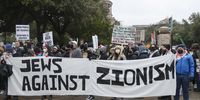 Protesters hold a 'Jews against Zionism' sign during a Protect Palestine Rally at the Texas State Capitol in Austin, Texas, USA, 21 January 2024. Thousands of Israelis and Palestinians have been killed since the militant group Hamas launched an unprecedented attack on Israel from the Gaza Strip on 07 October 2023, and the Israeli strikes on the Palestinian enclave which followed it.  EPA-EFE/Adam Davis