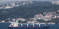Sierra Leone-flagged cargo ship Razoni that left the port of Odesa with the first grain shipment for export, sails through the Bosphorus after an inspection in Istanbul, Turkey, 03 August 2022. The Razoni carries over 26,000 tons of corn and is bound for Tripoli, Lebanon with a stopover in Istanbul for inspection. It is the first ship exporting Ukrainian grain since a safe passage deal was signed between Ukraine and Russia on 22 July in Istanbul. (Photo: EPA-EFE / Sedat Suna) 