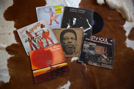 Shifting vinyl with my grandfather’s records