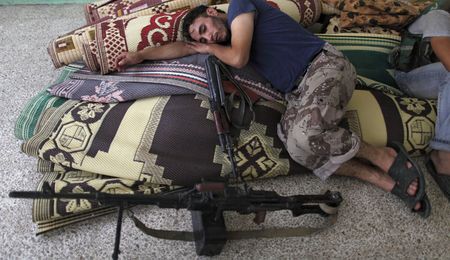 Assad forces pound Aleppo, declare Damascus victory