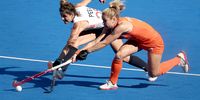 Freeke Moes (R) of the Netherlands in action against Flora Peel of Great Britain in the Women quarterfinal between the Netherlands and Great Britain of the Field Hockey competitions in the Paris 2024 Olympic Games, at the Yves-du-Manoir Stadium in Colombes, France, 05 August 2024.  EPA-EFE/CHRISTOPHE PETIT TESSON