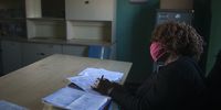 A caregiver performs administrative work. (Photo: Shiraaz Mohamed)