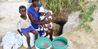 Anna Nduna and her children, including her three-month-old twins. (Photo: Darlington Mwashita)