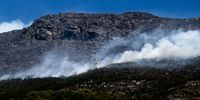 The mountain near Castle Rock in Simon’s Town in flames on 19 December 2023. (Photo: Kyra Wilkinson)