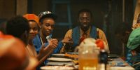 Hakeem Kae-Kazim as Mambo with some of his orphans in 'Riding with Sugar'