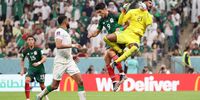 LUSAIL CITY, QATAR - NOVEMBER 30: Mohammed Al-Owais of Saudi Arabia defends an attempt against Raul Jimenez of Mexico during the FIFA World Cup Qatar 2022 Group C match between Saudi Arabia and Mexico at Lusail Stadium on November 30, 2022 in Lusail City, Qatar. (Photo by Michael Steele/Getty Images)