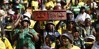 An ANC supporters hold a mock coffin at the Siyanqoba Rally at FNB Stadium on 25 May 2024 ahead of the upcoming national and provincial election on May 29, 2024.(Photo: Felix Dlangamandla)