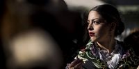 A regaora (young woman) takes part in the Las Carantoñas<br>festival. The role of regaoras is to spread rosemary on the floor of the church and at other scenes of the festival.(Photo by Carlos Gil Andreu/Getty Images)