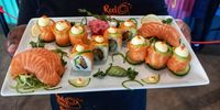Zama Mpungose with sushi platter and a salad and Khumbu Dlamini with a seafood basket and brekker. (Photo: Wanda Hennig)<br>