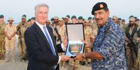 The commander of Bahrain’s navy meets Britain’s then defence secretary Michael Fallon during Exercise Pearl Dagger in December 2015. (Photo: Royal Navy)