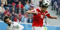 Mohamed Salah of Egypt (L) and Yuri Zhirkov of Russia in action during the FIFA World Cup 2018 group A preliminary round soccer match between Russia and Egypt in St.Petersburg, Russia, 19 June 2018. EPA-EFE/ETIENNE LAURENT<br>(RESTRICTIONS APPLY: Editorial Use Only, not used in association with any commercial entity - Images must not be used in any form of alert service or push service of any kind including via mobile alert services, downloads to mobile devices or MMS messaging - Images must appear as still images and must not emulate match action video footage - No alteration is made to, and no text or image is superimposed over, any published image which: (a) intentionally obscures or removes a sponsor identification image; or (b) adds or overlays the commercial identification of any third party which is not officially associated with the FIFA World Cup)  EPA-EFE/ETIENNE LAURENT   EDITORIAL USE ONLY  EDITORIAL USE ONLY