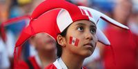 A supporter of Peru watches the broadcast of the FIFA World Cup 2018 group C preliminary round soccer match between France and Peru at the FIFA Fan Zone in Sochi, Russia, 21 June 2018.  EPA-EFE/MOHAMED MESSARA