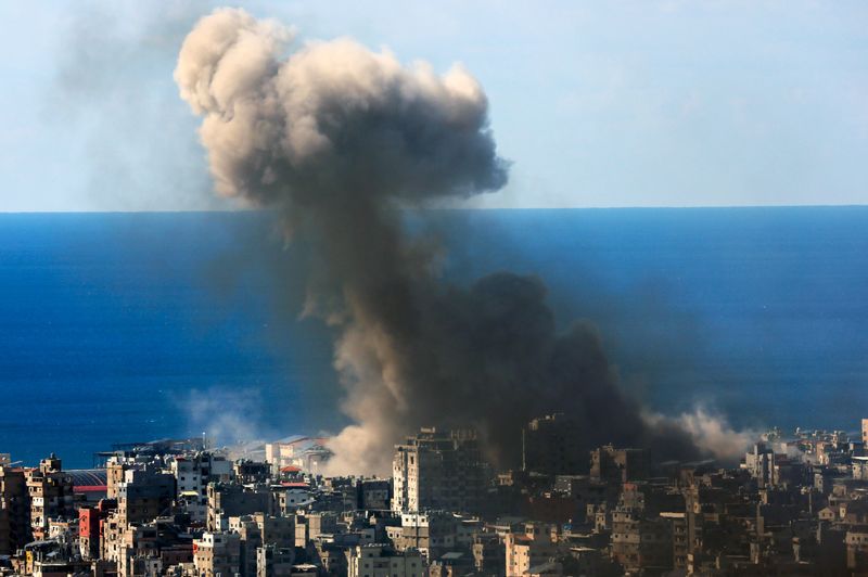 Israel pounds Beirut suburbs after Hezbollah fires volley of rockets