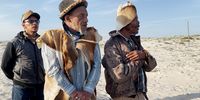 Paramount chief Anthony Andrews (center) and Chief Nicolaas Booysens (right) at the ceremony at the end of the film. (Photo: ‘Ours Not Mine’ film)