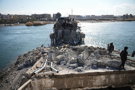Syrian government says it controls prison in Raqqa with Islamic State-linked detainees