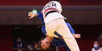 TOKYO, JAPAN - JULY 24: Katharina Menz of Germany and Mary Dee Vargas Ley of Chile compete during the Women’s Judo 48kg Elimination Round of 32 on day one of the Tokyo 2020 Olympic Games at Nippon Budokan on July 24, 2021 in Tokyo, Japan. (Photo by Harry How/Getty Images)