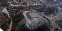 The sprawl of out-of-control chrome operations in North West meets the sprawl of an informal settlement on 31 July 2026
