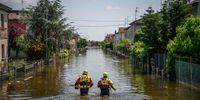 CONSELICE, ITALY - MAY 25: Special operators (OPSA) of the Italian Red Cross and firefighters rescuers seek and help residents blocked in their homes after heavy rains caused flooding across Italy's northern Emilia Romagna region, on May 25, 2023 in Conselice, Italy. The region of Emilia-Romagna experienced severe flooding in the last week, resulting in widespread damage and more than a dozen deaths. (Photo by Antonio Masiello/Getty Images)
