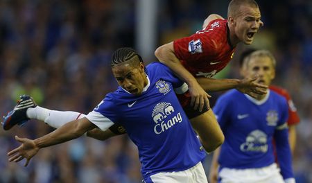 Everton stuns Man United in league opener