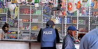 Policemen during an  inspection of spaza shops in Kwazakhele, Gqeberha, on 11 Novembe 2024. (Photo: Gallo Images / Die Burger / Lulama Zenzile)
